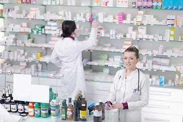 Image showing team of pharmacist chemist woman  in pharmacy drugstore