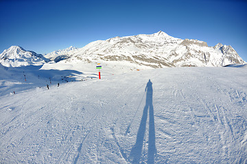 Image showing High mountains under snow in the winter