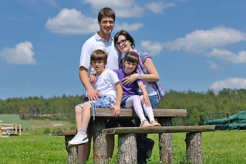 Image showing happy young family have fun outdoors