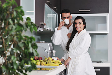 Image showing Young love couple taking fresh morning cup of coffee