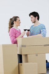 Image showing Young couple moving in new home