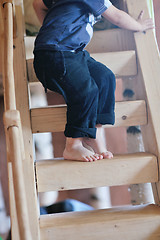 Image showing beautiful young child making first steps