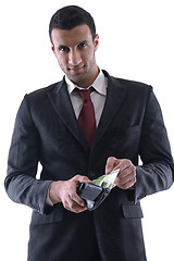 Image showing Business man holding money