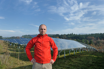 Image showing Male solar panel engineer at work place