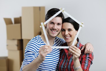 Image showing Young couple moving in new house