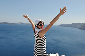 Image showing Greek woman on the streets of Oia, Santorini, Greece