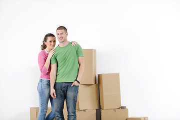 Image showing Young couple moving in new house