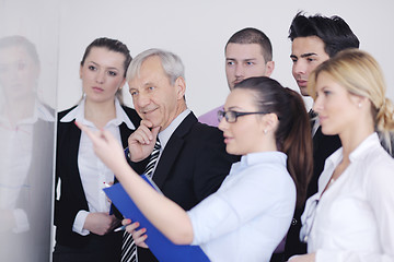 Image showing Senior business man giving a presentation