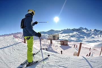 Image showing skiing on fresh snow at winter season at beautiful sunny day