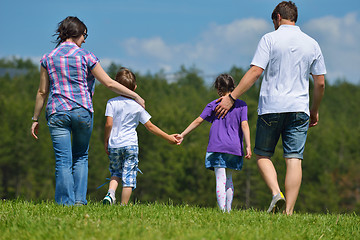 Image showing happy young family have fun outdoors