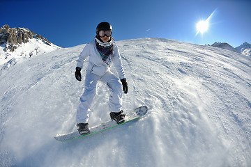 Image showing skiing on fresh snow at winter season at beautiful sunny day