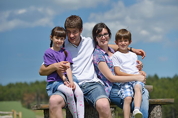 Image showing happy young family have fun outdoors