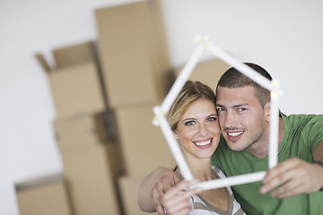 Image showing Young couple moving in new home