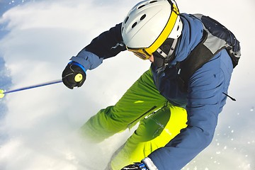 Image showing skiing on fresh snow at winter season at beautiful sunny day