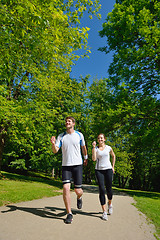 Image showing Young couple jogging