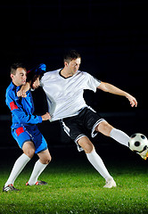 Image showing football players in action for the ball