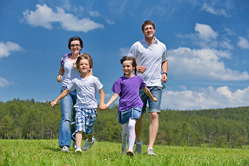 Image showing happy young family have fun outdoors