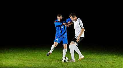 Image showing football players in action for the ball