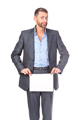 Image showing Portrait businessman showing an empty board to write