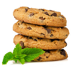 Image showing Chocolate cookies with mint leaves