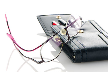 Image showing Leather pencil case and glasses