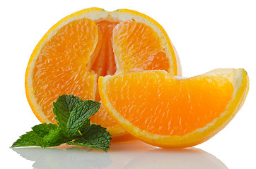 Image showing Orange fruit segment and mint leaf 