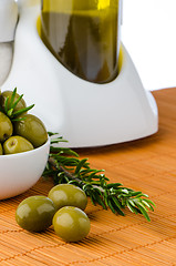 Image showing Green olives in a white ceramic bowl