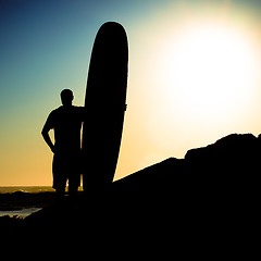 Image showing Long boarder watching the waves