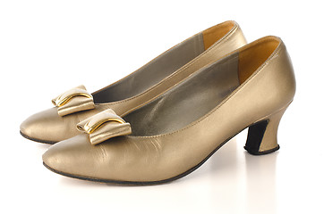 Image showing Gold high-heeled shoes