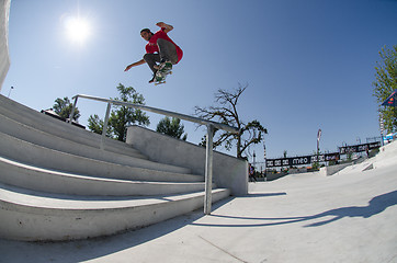 Image showing Andre Pereira flying over the stairs