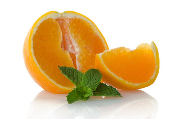 Image showing Orange fruit segment and mint leaf 