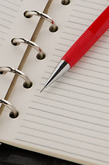 Image showing Note book and pencil