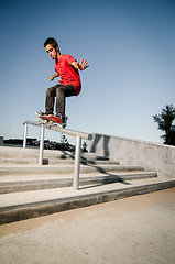 Image showing Skateboarder on rail 