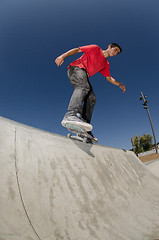 Image showing Skateboarder on a curb 