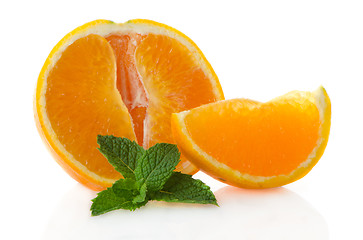 Image showing Orange fruit segment and mint leaf 