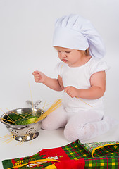 Image showing baby girl in the cook hat