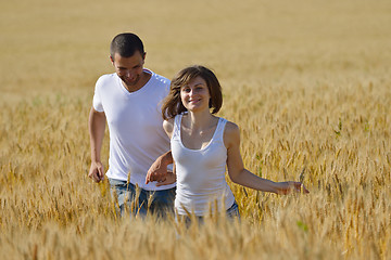 Image showing happy couple in wheat field