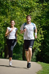 Image showing Young couple jogging at morning