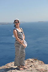 Image showing Greek woman on the streets of Oia, Santorini, Greece