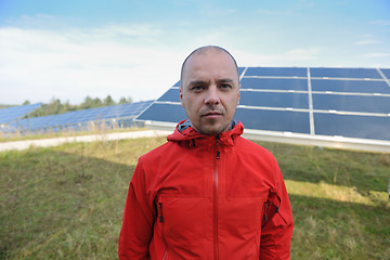 Image showing Male solar panel engineer at work place