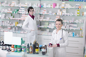 Image showing team of pharmacist chemist woman  in pharmacy drugstore