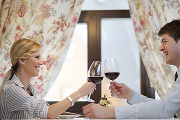 Image showing young couple having dinner at a restaurant