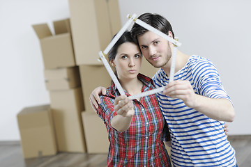 Image showing Young couple moving in new home