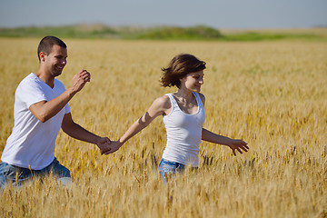 Image showing happy couple in wheat field