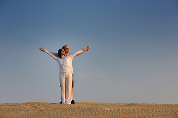 Image showing couple enjoying the sunset