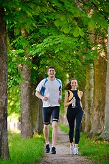 Image showing Young couple jogging