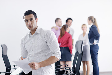 Image showing young business man at meeting