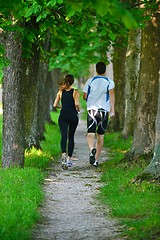 Image showing Young couple jogging