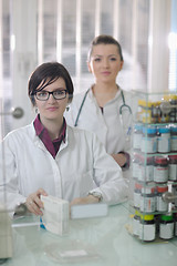 Image showing team of pharmacist chemist woman  in pharmacy drugstore