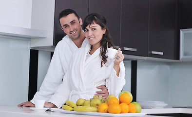 Image showing young couple have fun in modern kitchen